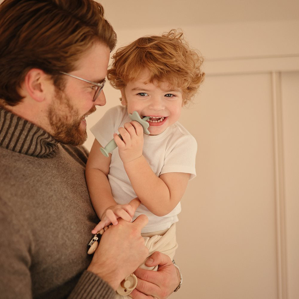 Mushie® Silikonska zobna ščetka Cambridge Blue Mushie