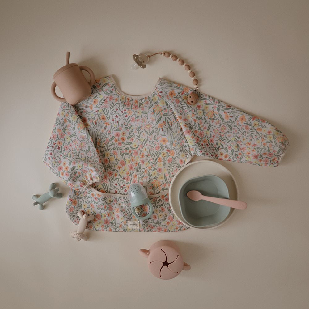 Mushie® Slinček z rokavi Pastel Blooms Mushie