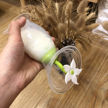 Slika za Haakaa® Silikonska izdajalica za mlijeko 2. gen. 150ml i Poklopac Ružica